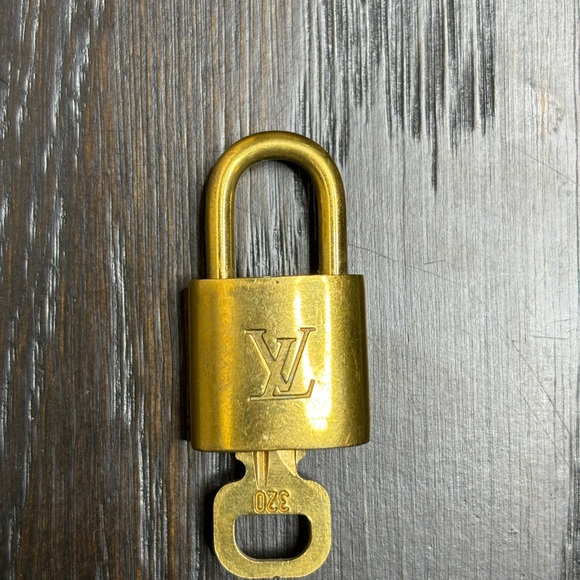 Louis Vuitton Gold Padlock with Key 320 - Picture 1 of 1